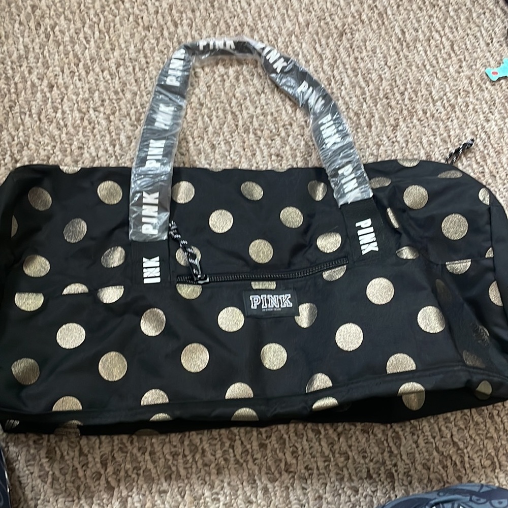Victoria’s Secret pink duffle bag
